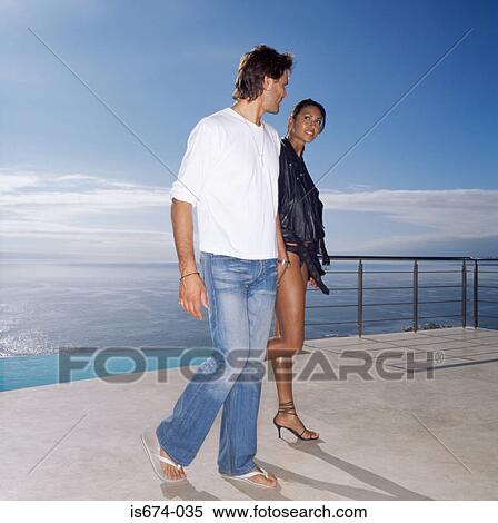 Stock Photography - Sexy couple holding hands. Fotosearch
