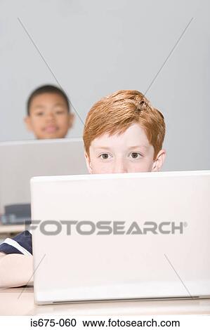 Boys using laptop computers View Large Photo Image Stock Image - Boys using laptop computers. Fotosearch