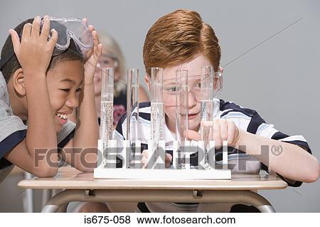 Children in chemistry class View Large Photo Image Stock Photo - Children in chemistry class. Fotosearch