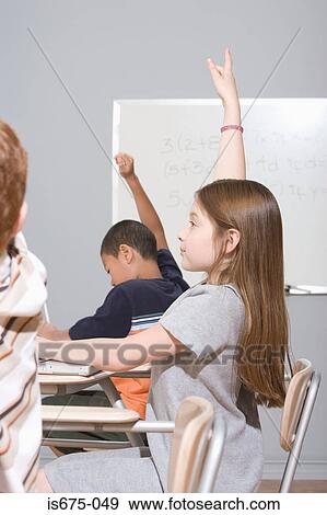 Stock Photo - Children raising their hands. Fotosearch