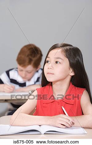 Stock Photography - Girl in class. Fotosearch