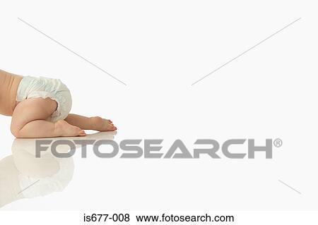Stock Photo - Baby crawling away. Fotosearch
