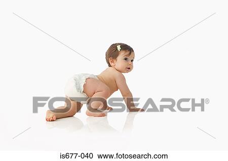 Stock Image - Baby girl crawling. Fotosearch
