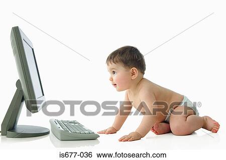 Baby looking at computer View Large Photo Image Stock Photograph - Baby looking at computer. Fotosearch