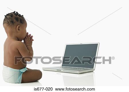 Baby with laptop computer View Large Photo Image Stock Image - Baby with laptop computer. Fotosearch