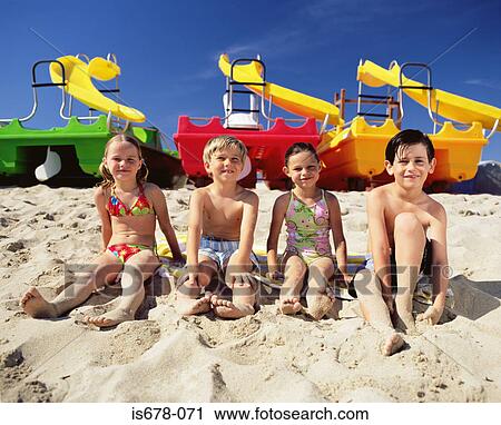 Children at the beach View Large Photo Image Stock Image - Children at the beach. Fotosearch