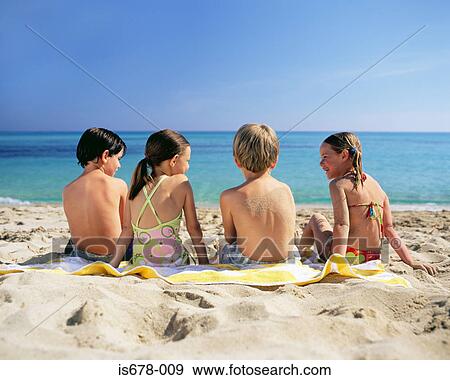 Children at the beach View Large Photo Image Stock Photo - Children at the beach. Fotosearch