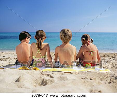 Children at the beach View Large Photo Image Stock Photo - Children at the beach. Fotosearch