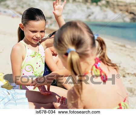 Children playing on the beach View Large Photo Image Picture - Children playing on the beach. Fotosearch
