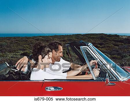 Stock Photography - Couple on a road trip. Fotosearch