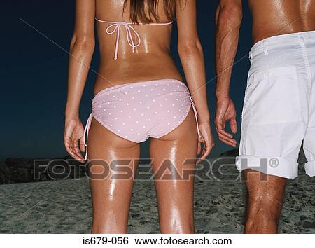 Couple on the beach View Large Photo Image Stock Photograph - Couple on the beach. Fotosearch