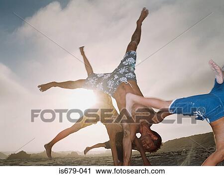 Family cartwheeling View Large Photo Image Stock Image - Family cartwheeling. Fotosearch