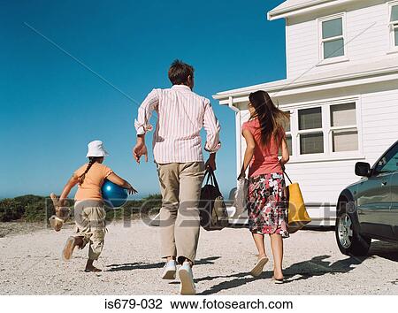 Family running for the beach View Large Photo Image Stock Image - Family running for the beach. Fotosearch