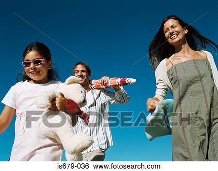 Family running View Large Photo Image Stock Photograph - Family running. Fotosearch