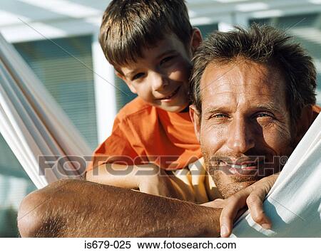 Father and son on hammock View Large Photo Image Stock Photography - Father and son on hammock. Fotosearch
