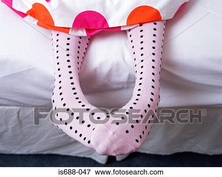 Feet hanging out of bed View Large Photo Image Stock Photo - Feet hanging out of bed. Fotosearch