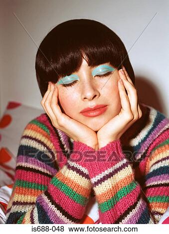Woman with eyes closed wearing bright eyeshadow View Large Photo Image Stock Photo - Woman with eyes closed wearing bright eyeshadow. Fotosearch