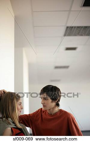 Stock Photo - Students flirting. Fotosearch
