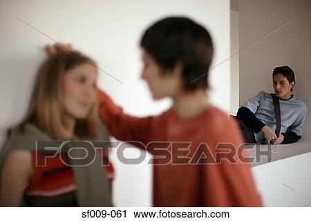 Stock Image - Students in a corridor. Fotosearch