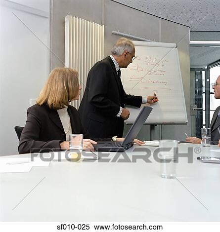 Business people in a presentation View Large Photo Image Stock Photography - Business people in a presentation. Fotosearch