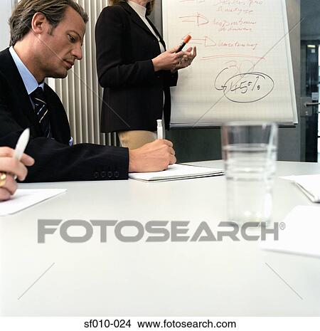 Business people in presentation View Large Photo Image Picture - Business people in presentation. Fotosearch