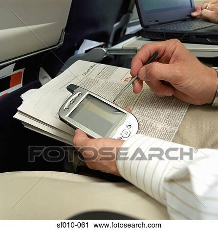 Business people on an aeroplane View Large Photo Image Stock Image - Business people on an aeroplane. Fotosearch