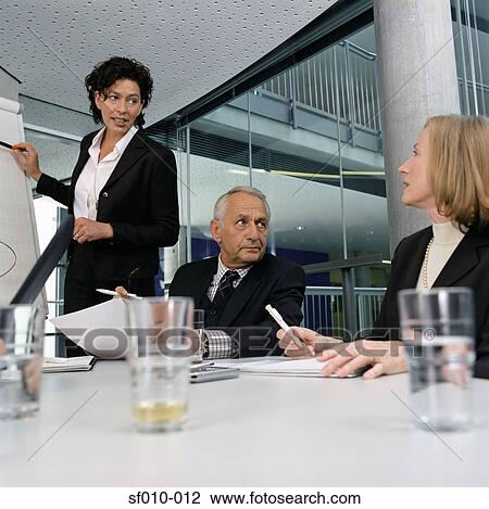 Businesswoman giving presentation View Large Photo Image Stock Image - Businesswoman giving presentation. Fotosearch