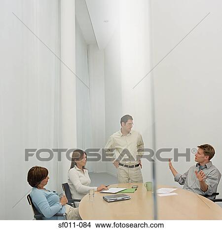 Businesspeople in conference room View Large Photo Image Picture - Businesspeople in conference room. Fotosearch