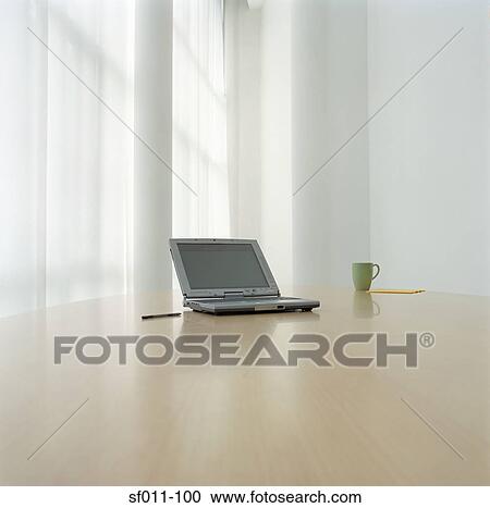 Laptop computer on desk View Large Photo Image Stock Image - Laptop computer on desk. Fotosearch