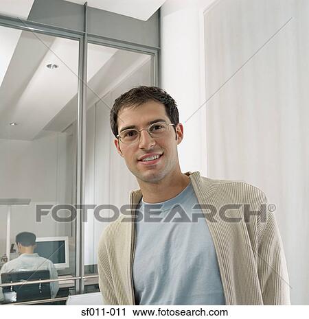 Male office worker View Large Photo Image Stock Image - Male office worker. Fotosearch
