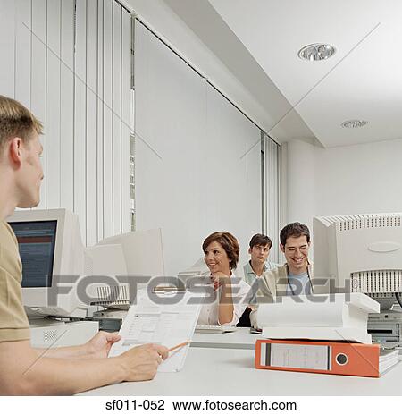 People working in office View Large Photo Image Stock Image - People working in office. Fotosearch