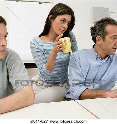 Three office workers View Large Photo Image Stock Photo - Three office workers. Fotosearch