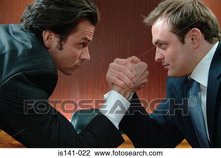 Arm-wrestling in boardroom View Large Photo Image Stock Image - Arm-wrestling in boardroom. Fotosearch