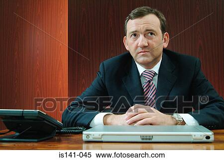 Businessman in boardroom View Large Photo Image Stock Photography - Businessman in boardroom. Fotosearch