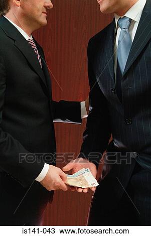 Businessman makes cash deal View Large Photo Image Stock Image - Businessman makes cash deal. Fotosearch