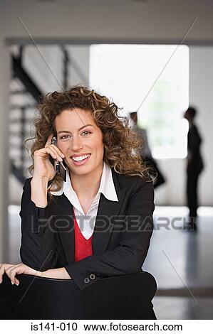 Businesswoman on mobile phone View Large Photo Image Stock Image - Businesswoman on mobile phone. Fotosearch