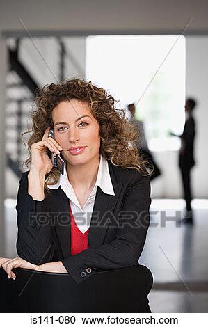 Businesswoman on mobile phone View Large Photo Image Stock Image - Businesswoman on mobile phone. Fotosearch