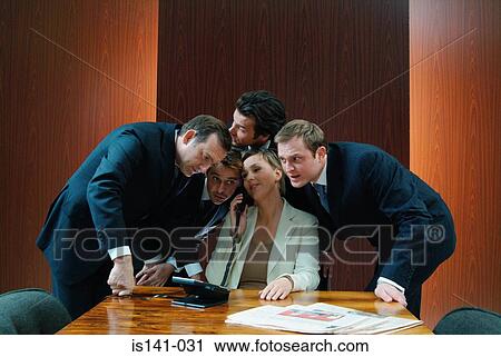 Fun at boardroom meeting View Large Photo Image Stock Image - Fun at boardroom meeting . Fotosearch