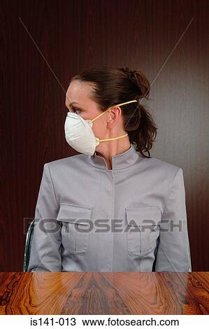 Masked woman in boardroom View Large Photo Image Stock Image - Masked woman in boardroom. Fotosearch