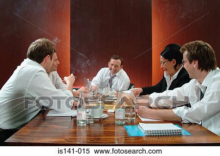 Smoking in boardroom meeting View Large Photo Image Stock Photography - Smoking in boardroom meeting . Fotosearch