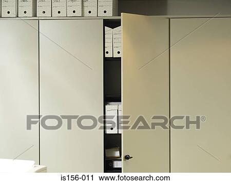 Stock Image - An open office cupboard. Fotosearch