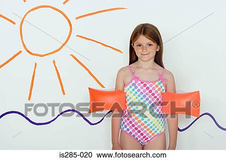Girl by picture of sun and sea View Large Photo Image Stock Image - Girl by picture of sun and sea. Fotosearch