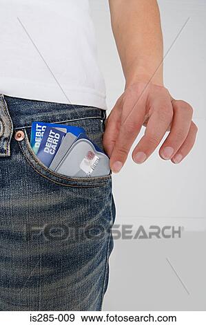 Stock Photo - Person with credit cards in his pocket. Fotosearch