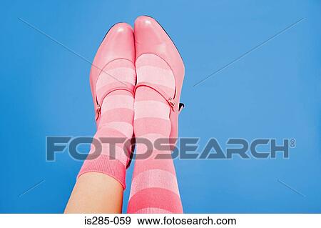 Woman wearing pink socks and shoes View Large Photo Image Stock Photo - Woman wearing pink socks and shoes. Fotosearch