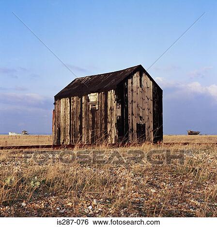 Dilapidated shed on a plain View Large Photo Image Stock Photograph - Dilapidated shed on a plain. Fotosearch