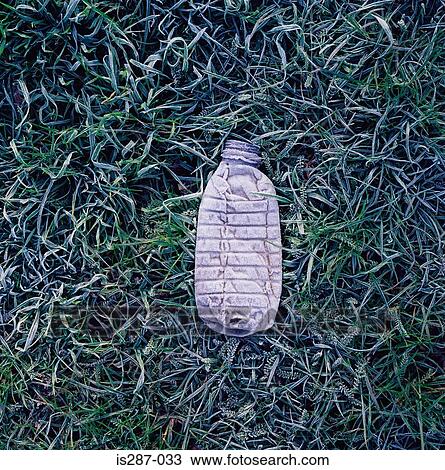 Plastic bottle on the ground View Large Photo Image Stock Image - Plastic bottle on the ground. Fotosearch