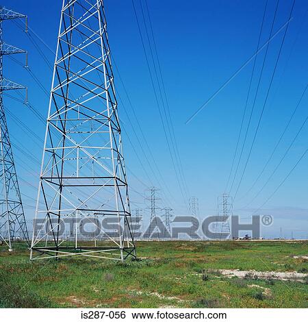 Pylons in a field View Large Photo Image Stock Photograph - Pylons in a field. Fotosearch