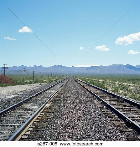 Railway track leading to the mountains View Large Photo Image Stock Photography - Railway track leading to the mountains. Fotosearch