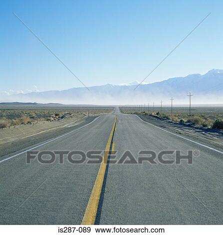 Road into the mountains View Large Photo Image Stock Photo - Road into the mountains. Fotosearch