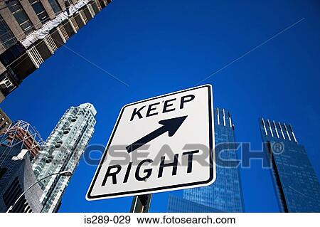 Road sign and skyscrapers View Large Photo Image Stock Photo - Road sign and skyscrapers. Fotosearch